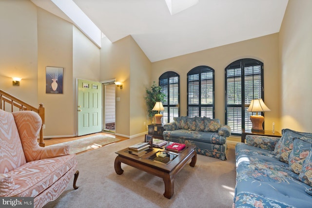 10112 Collington Campus Dr Unit 7, Bowie, MD 20721 - carpeted living room featuring a skylight and high vaulted ceiling