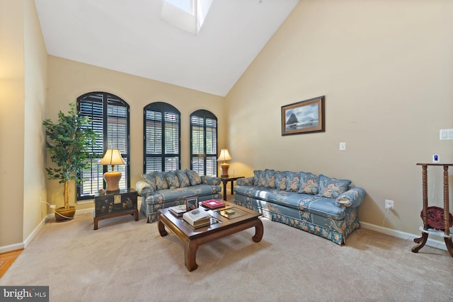10112 Collington Campus Dr Unit 7, Bowie, MD 20721 - carpeted living room with plenty of natural light, high vaulted ceiling, and a skylight