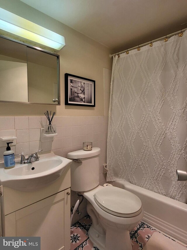 224 W Rittenhouse Sq Unit 3118, Philadelphia, PA 19103 - full bathroom featuring vanity, shower / bath combo, tile walls, and tile patterned flooring