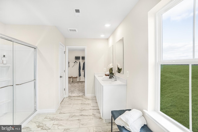 20 Hidden Brook Blvd, Dover, DE 19904 - bathroom featuring marble finish flooring, vanity, a shower stall, plenty of natural light, and recessed lighting