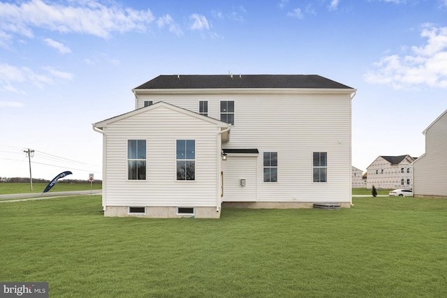 20 Hidden Brook Blvd, Dover, DE 19904 - rear view of house featuring a lawn