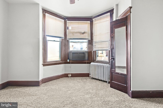 2904 N Taney St, Philadelphia, PA 19132 - empty room featuring radiator heating unit, cooling unit, and ceiling fan