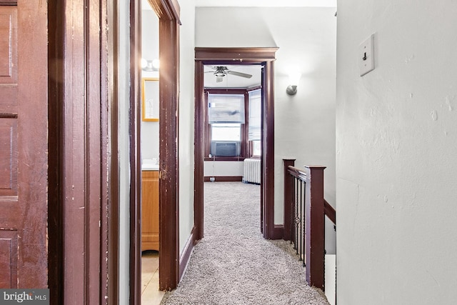2904 N Taney St, Philadelphia, PA 19132 - hall featuring radiator heating unit, an upstairs landing, light colored carpet, and cooling unit