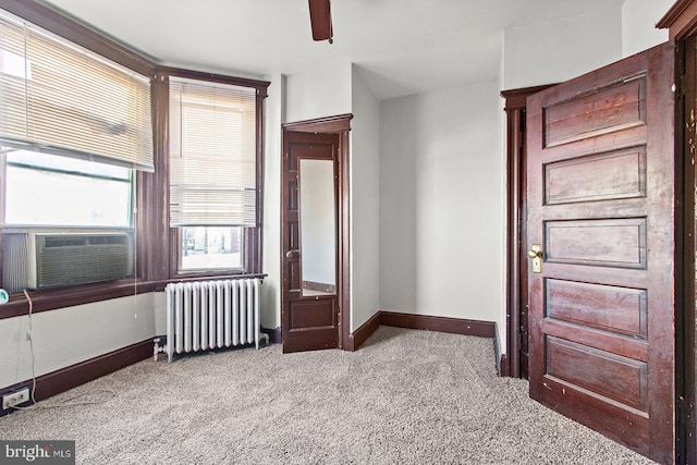 2904 N Taney St, Philadelphia, PA 19132 - unfurnished room featuring radiator, carpet, and a ceiling fan