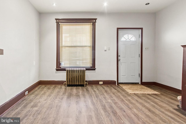 2904 N Taney St, Philadelphia, PA 19132 - foyer entrance featuring radiator heating unit, wood finished floors, and recessed lighting
