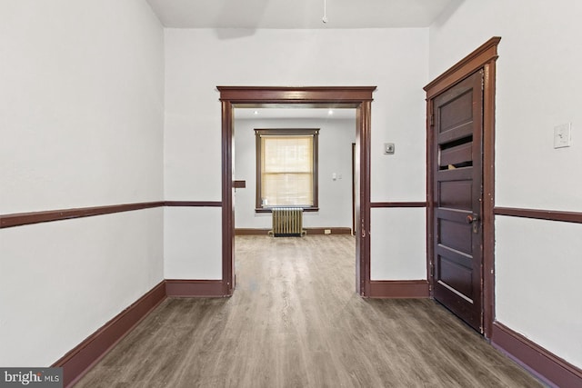 2904 N Taney St, Philadelphia, PA 19132 - corridor with radiator heating unit and wood finished floors