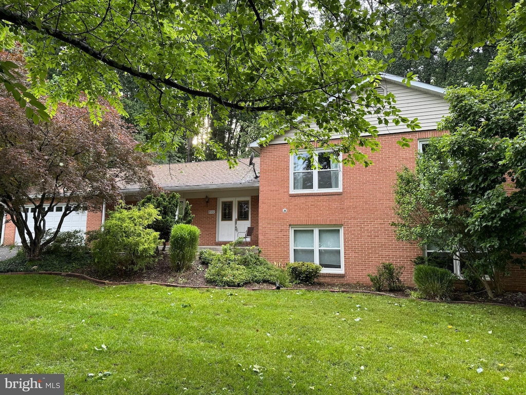6102 Gallery St, Bowie, MD 20720 - split level home with a front yard and brick siding