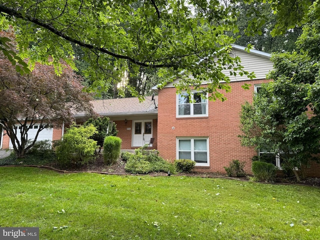 6102 Gallery St, Bowie, MD 20720 - split level home with a front yard and brick siding