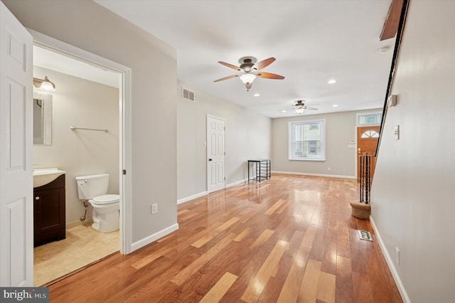 211 Dawson St, Philadelphia, PA 19128 - unfurnished living room with a ceiling fan, light wood-style flooring, and recessed lighting