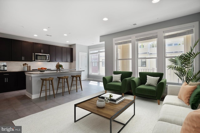 1220 Main Line Blvd Unit 102, Alexandria, VA 22301 - living room with light tile patterned floors and recessed lighting