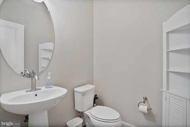 1220 Main Line Blvd Unit 102, Alexandria, VA 22301 - half bathroom with a sink and toilet