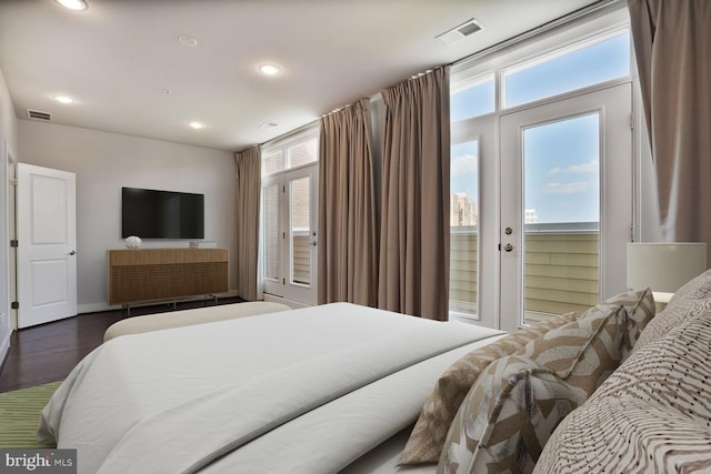 1220 Main Line Blvd Unit 102, Alexandria, VA 22301 - bedroom with multiple windows, recessed lighting, wood finished floors, and french doors