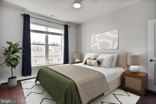1220 Main Line Blvd Unit 102, Alexandria, VA 22301 - bedroom featuring wood finished floors, multiple windows, and ceiling fan