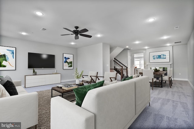 1220 Main Line Blvd Unit 102, Alexandria, VA 22301 - living room with light carpet, stairs, recessed lighting, and ceiling fan