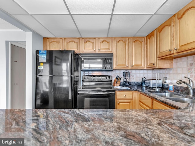 107 Convention Center Dr Unit 1410D, Ocean City, MD 21842 - kitchen featuring black appliances, dark stone counters, tasteful backsplash, a drop ceiling, and light brown cabinets
