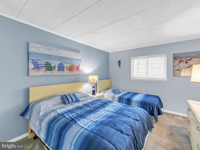 107 Convention Center Dr Unit 1410D, Ocean City, MD 21842 - carpeted bedroom featuring baseboards and a textured ceiling