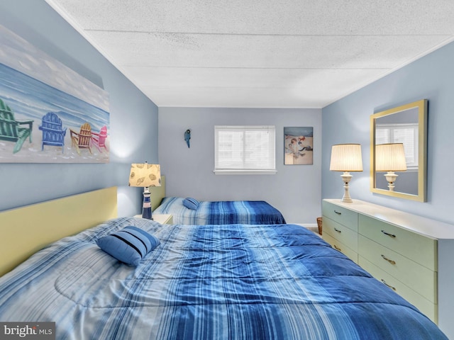 107 Convention Center Dr Unit 1410D, Ocean City, MD 21842 - bedroom featuring a textured ceiling