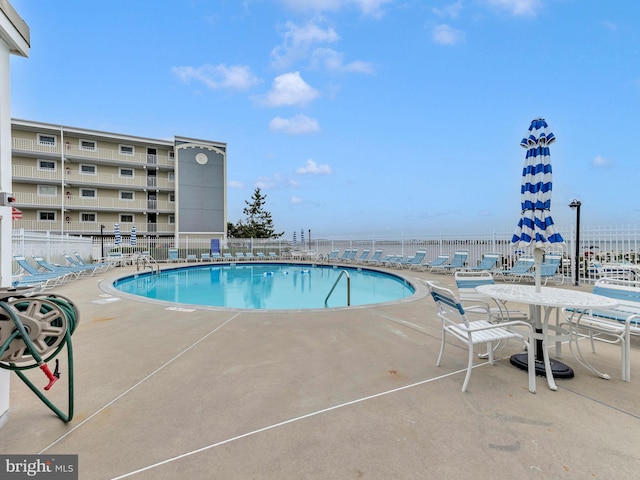 107 Convention Center Dr Unit 1410D, Ocean City, MD 21842 - community pool featuring a patio area