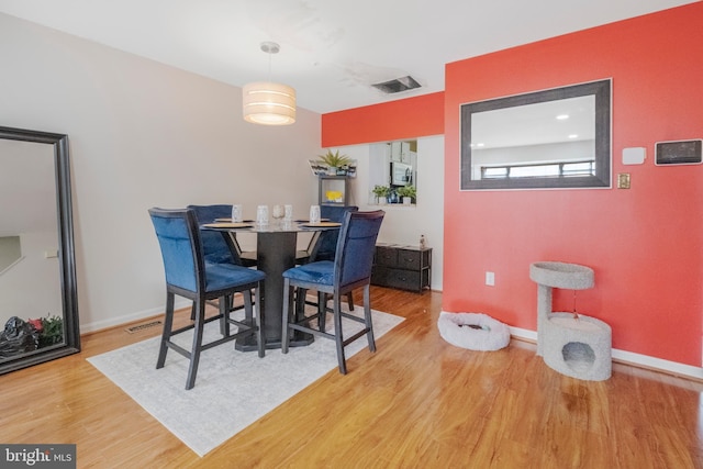 6571 Ronald Rd, Capitol Heights, MD 20743 - dining room featuring wood finished floors and baseboards