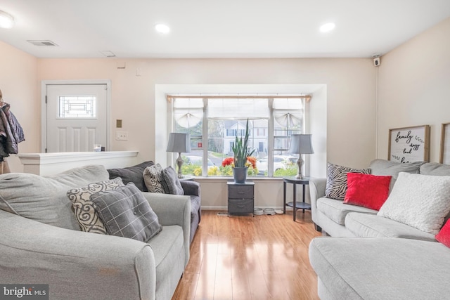 6571 Ronald Rd, Capitol Heights, MD 20743 - living room featuring wood finished floors and recessed lighting