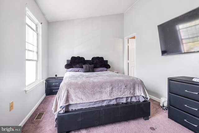 6571 Ronald Rd, Capitol Heights, MD 20743 - bedroom with carpet floors and multiple windows