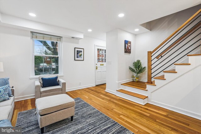 2806 S Abingdon St Unit A, Arlington, VA 22206 - living area featuring wood finished floors, stairs, and recessed lighting