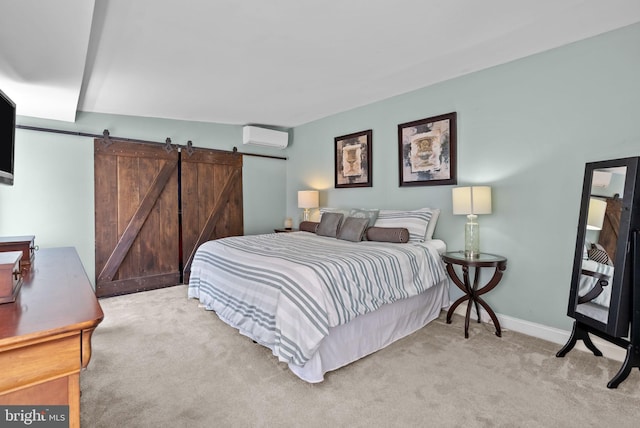 1518 Mount Vernon St Unit 3, Philadelphia, PA 19130 - bedroom featuring carpet, an AC wall unit, and a barn door
