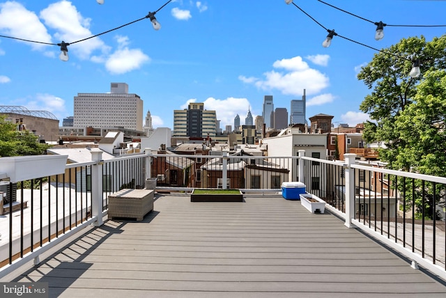 1518 Mount Vernon St Unit 3, Philadelphia, PA 19130 - wooden deck featuring a skyline view
