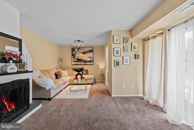 8030 Ditman St Unit 138X, Philadelphia, PA 19136 - carpeted living area with baseboards and track lighting