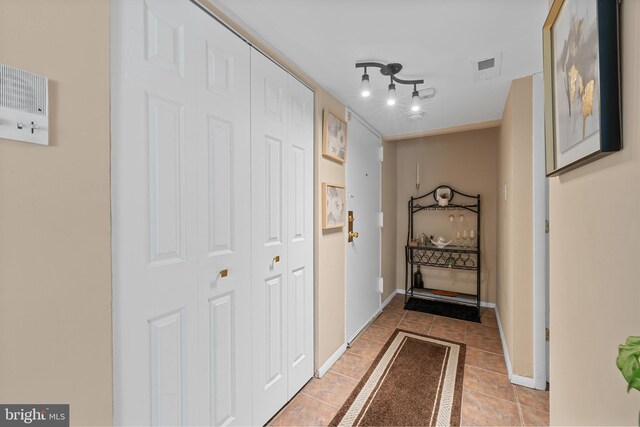 8030 Ditman St Unit 138X, Philadelphia, PA 19136 - hall featuring light tile patterned flooring and baseboards