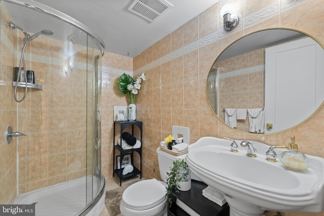 8030 Ditman St Unit 138X, Philadelphia, PA 19136 - bathroom with a shower stall and tile walls