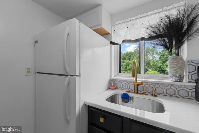 8030 Ditman St Unit 138X, Philadelphia, PA 19136 - kitchen featuring freestanding refrigerator and light countertops