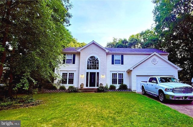 1632 Whispering Woods Dr, Williamstown, NJ 08094 - view of front facade with an attached garage, a front lawn, and driveway