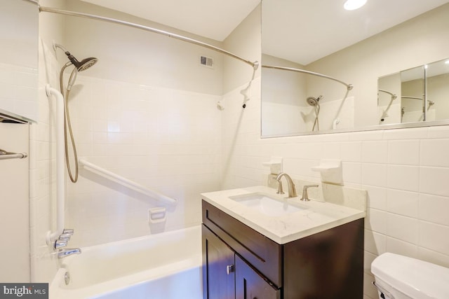 53 Skyhill Rd Unit 204, Alexandria, VA 22314 - full bathroom with shower / tub combination, vanity, and tile walls
