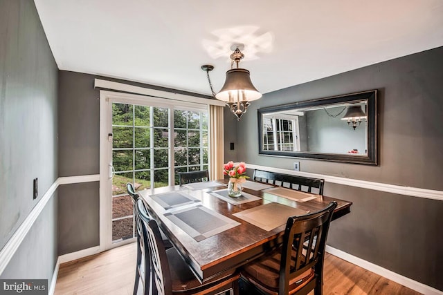 6614 Mccahill Dr, Laurel, MD 20707 - dining space featuring light wood finished floors and a chandelier