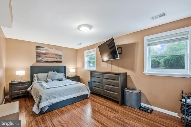 6614 Mccahill Dr, Laurel, MD 20707 - bedroom with wood finished floors and baseboards