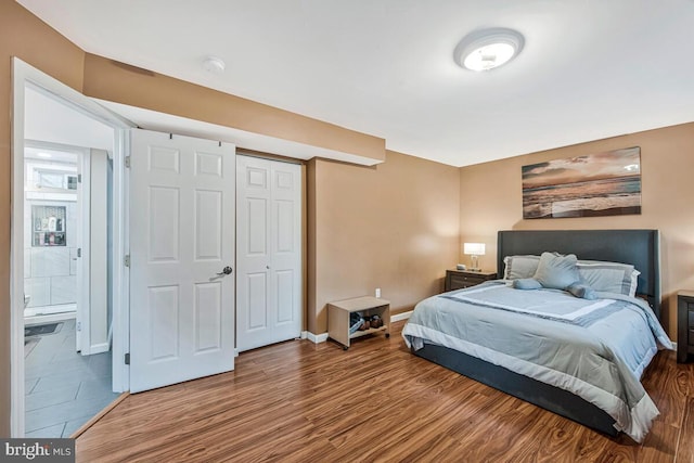 6614 Mccahill Dr, Laurel, MD 20707 - bedroom featuring wood finished floors and a closet