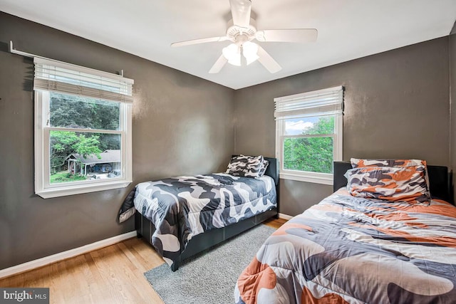 6614 Mccahill Dr, Laurel, MD 20707 - bedroom featuring wood finished floors and a ceiling fan