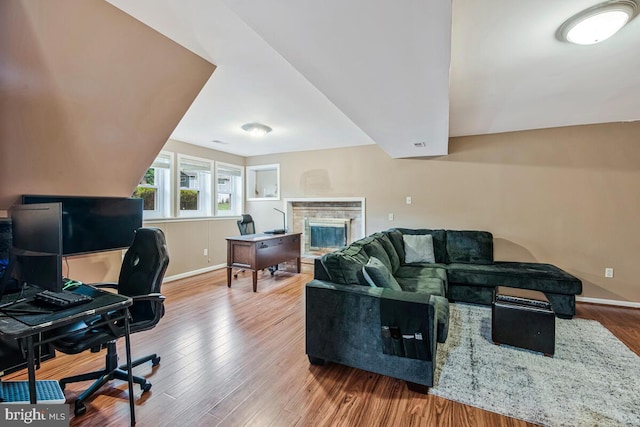 6614 Mccahill Dr, Laurel, MD 20707 - office space with wood finished floors and a glass covered fireplace