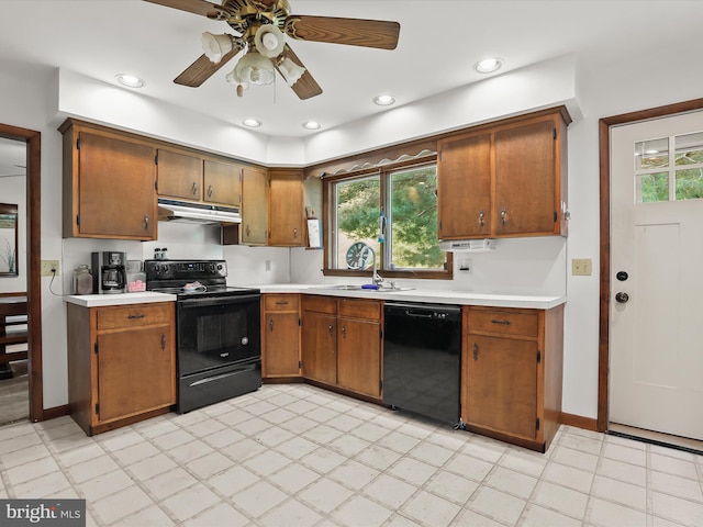 4704 Baughman Ml, Manchester, MD 21102 - kitchen with black appliances, under cabinet range hood, light countertops, ceiling fan, and recessed lighting