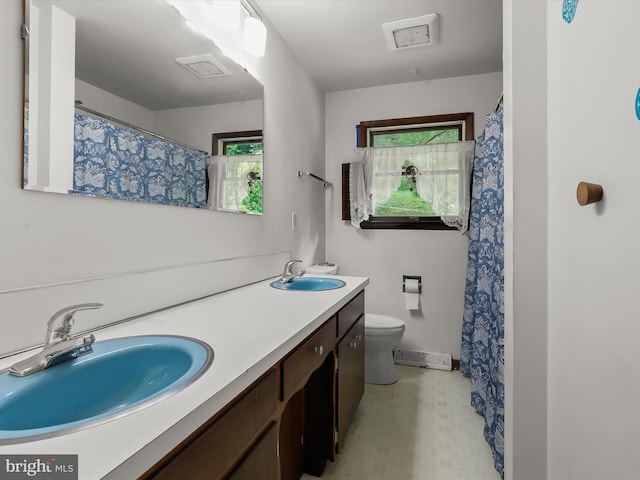 4704 Baughman Ml, Manchester, MD 21102 - full bath featuring double vanity and a baseboard heating unit