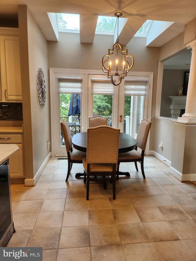 12024 Walnut Branch Rd, Reston, VA 20194 - dining area with a skylight, a chandelier, and wine cooler