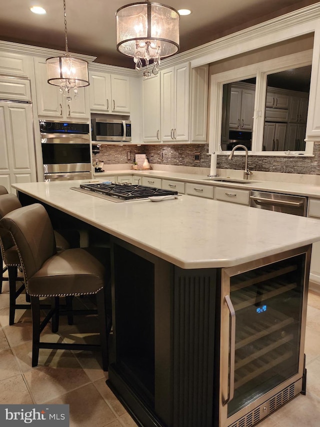 12024 Walnut Branch Rd, Reston, VA 20194 - kitchen featuring beverage cooler, appliances with stainless steel finishes, a kitchen island, a chandelier, and light countertops