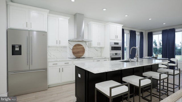 2664 River Birch Rd, Herndon, VA 20171 - kitchen with stainless steel appliances, wall chimney exhaust hood, decorative backsplash, a center island with sink, and white cabinetry