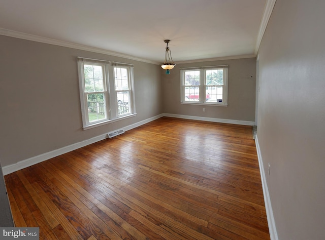 301 E Hanover St, Hanover, PA 17331 - spare room featuring wood-type flooring and ornamental molding