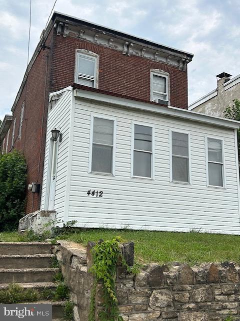 4412 Post Rd, Marcus Hook, PA 19061 - view of property exterior featuring brick siding