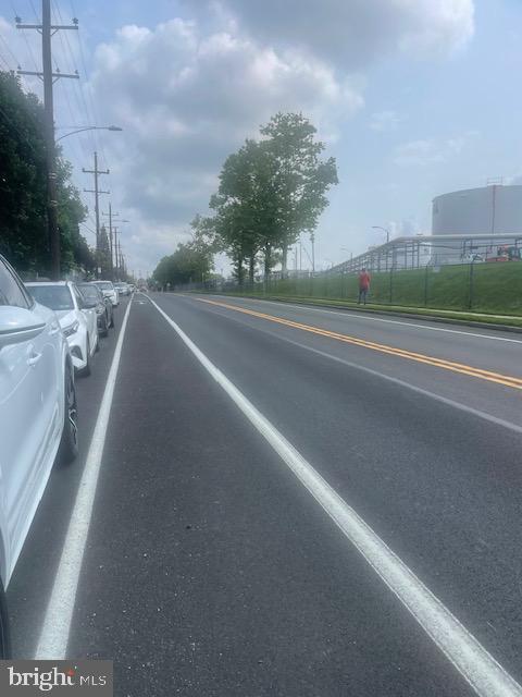 4412 Post Rd, Marcus Hook, PA 19061 - view of asphalt road featuring street lights