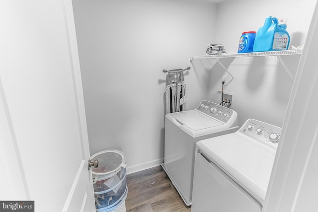 123 Hank Aaron Rd, Berkeley Springs, WV 25411 - laundry area featuring independent washer and dryer and light wood-style floors