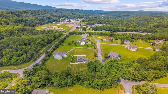 123 Hank Aaron Rd, Berkeley Springs, WV 25411 - aerial view of a heavily wooded area and a mountainous background