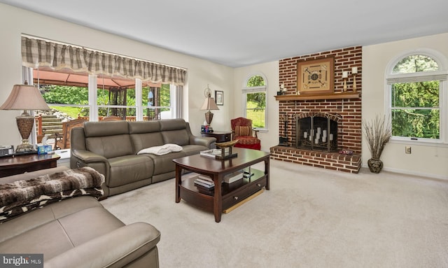 1043 Welsh Ayres Way, Downingtown, PA 19335 - living room with healthy amount of natural light, a fireplace, and carpet